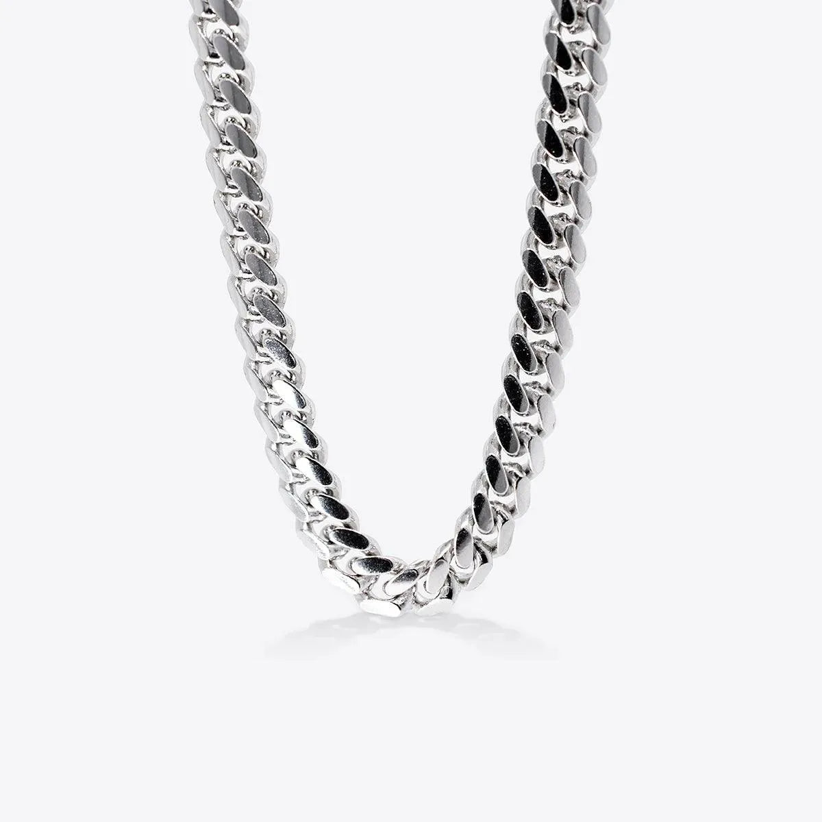 From the Simply Silver collection, this unisex Miami Cuban Link necklace showcases interlinked, thick, rounded links in a twisted pattern. Its polished shine stands out beautifully against a plain light background.